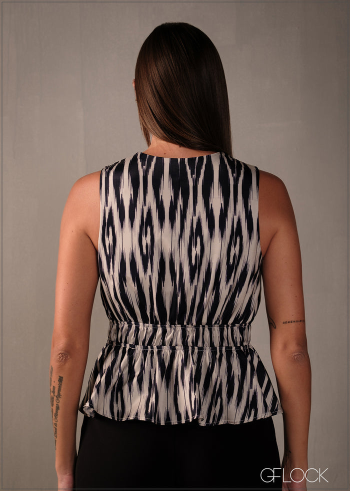 V-Neck Sleeveless Peplum Top - 160326