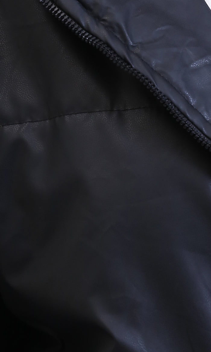 Close-up of a black jacket with a zipper