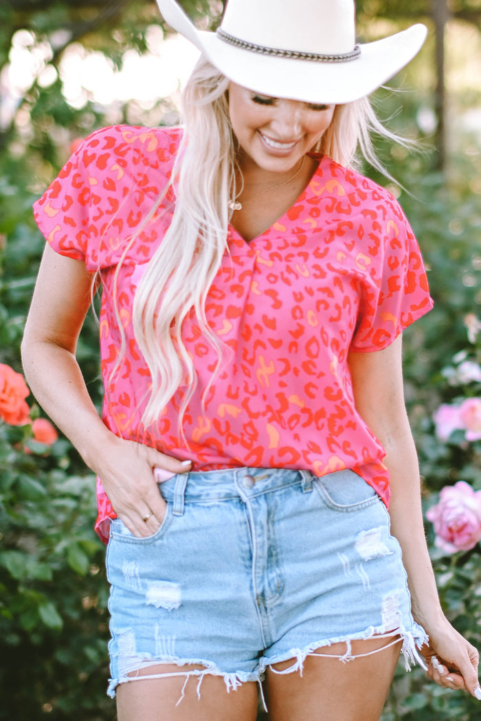 Blouse léopard rose à V-A WOMAN WE LOVE