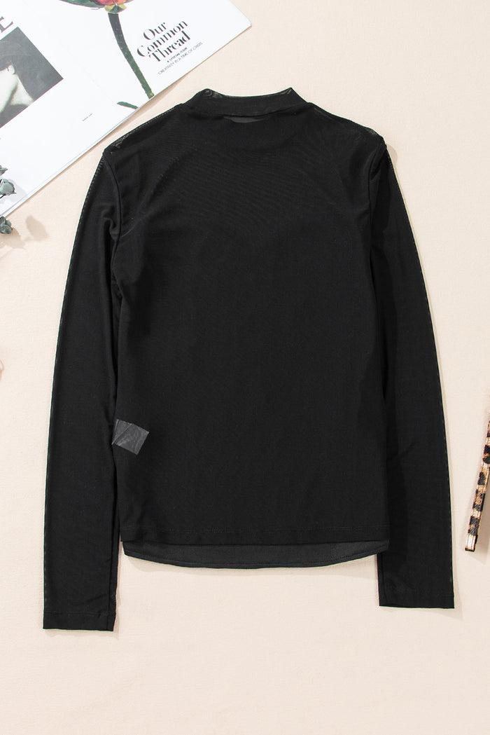 Blouse noire à col  à sequins-A WOMAN WE LOVE