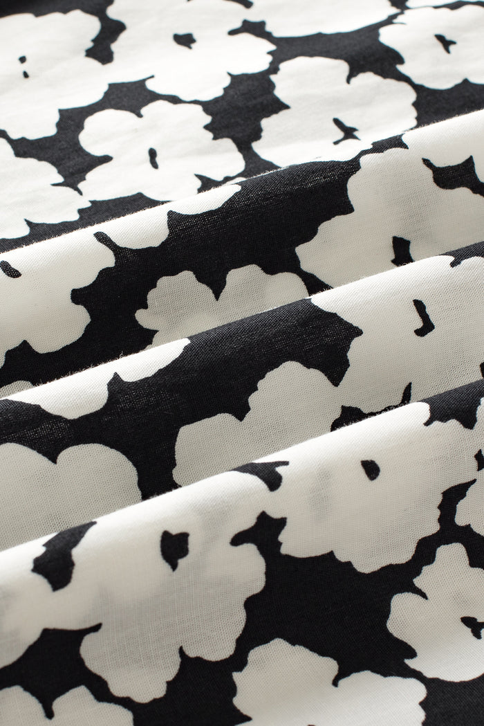 Blouse noire à manches volantées superposées Ric Rac contrastée à fleurs-A WOMAN WE LOVE