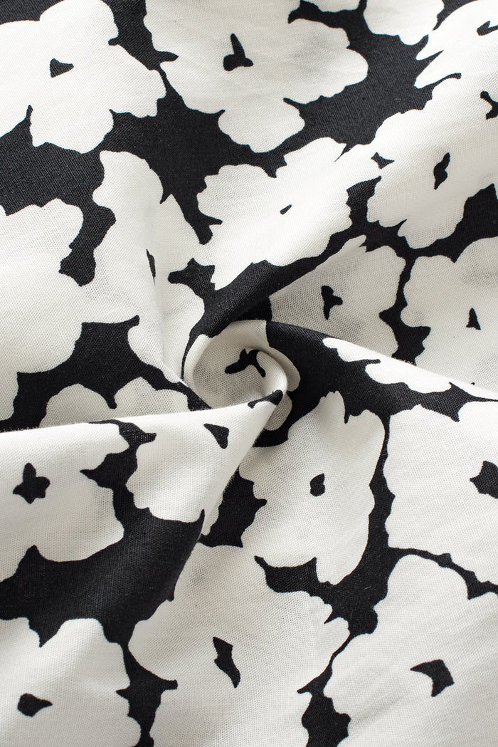 Blouse noire à manches volantées superposées Ric Rac contrastée à fleurs-A WOMAN WE LOVE