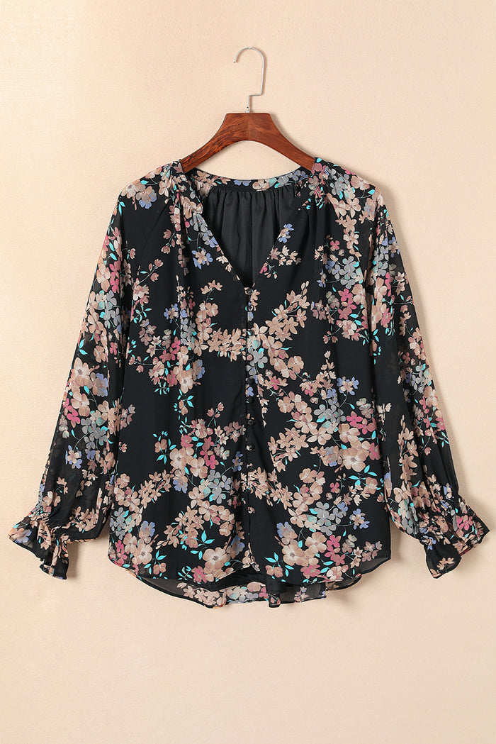 Blouse noire en mousseline à imprimé fleurs sauvages