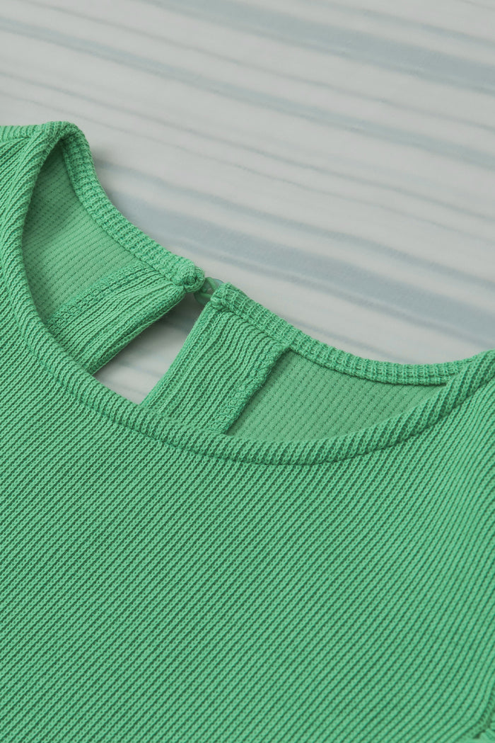 Blouse verte en tricot côtelé à manches bouffantes à volants-A WOMAN WE LOVE