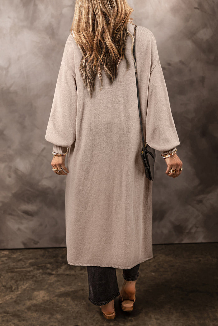 Cardigan long tricoté beige avec poches latérales ouvertes sur le devant-A WOMAN WE LOVE
