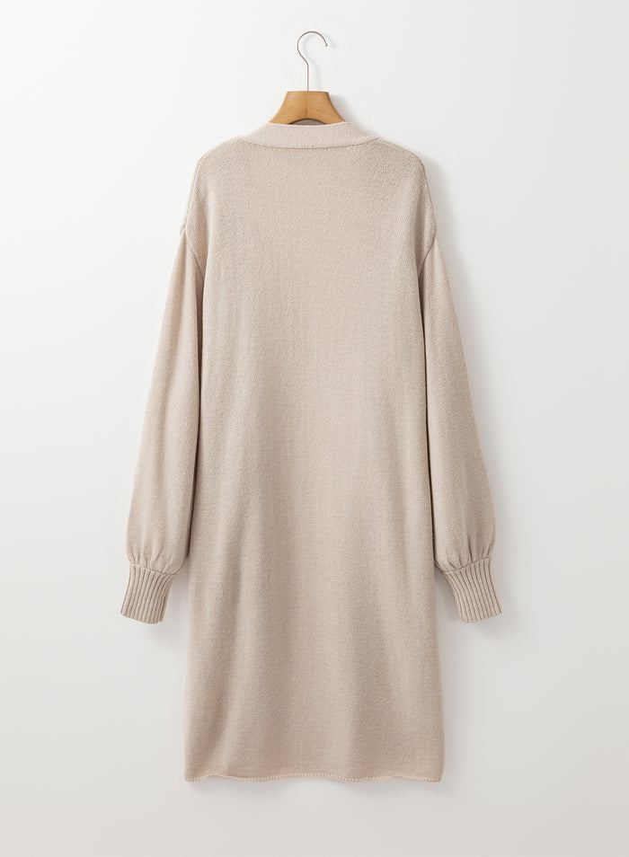 Cardigan long tricoté beige avec poches latérales ouvertes sur le devant-A WOMAN WE LOVE