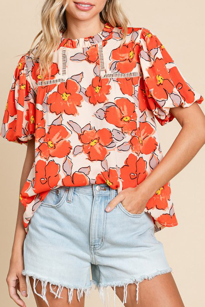 Chemisier ample orange à manches bouffantes et col volanté et motif floral-A WOMAN WE LOVE