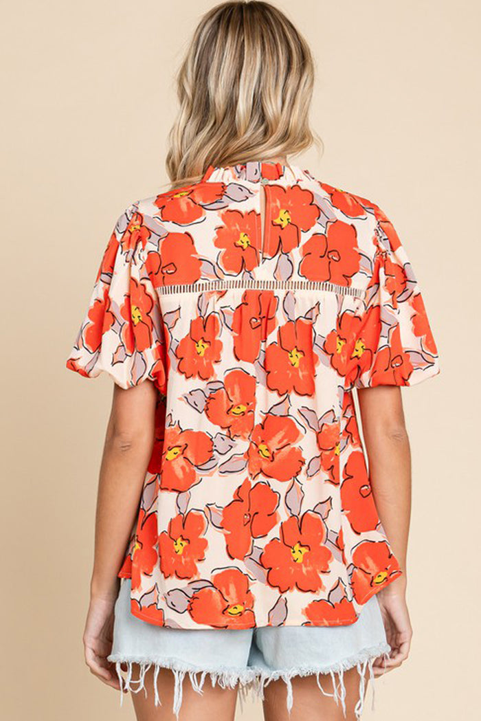 Chemisier ample orange à manches bouffantes et col volanté et motif floral-A WOMAN WE LOVE