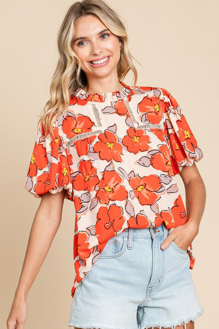 Chemisier ample orange à manches bouffantes et col volanté et motif floral-A WOMAN WE LOVE