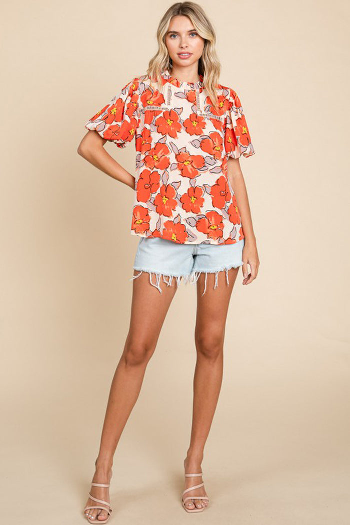 Chemisier ample orange à manches bouffantes et col volanté et motif floral-A WOMAN WE LOVE