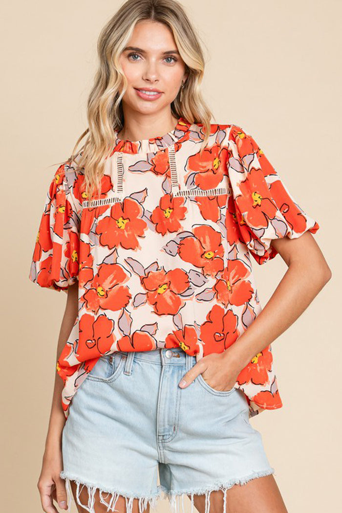 Chemisier ample orange à manches bouffantes et col volanté et motif floral-A WOMAN WE LOVE