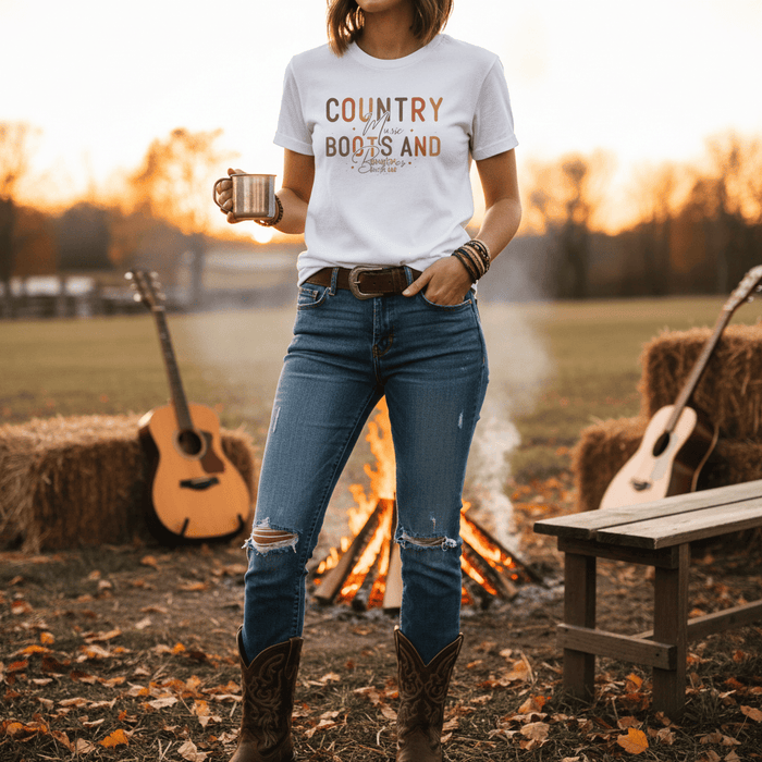 light blue t-shirt with boots and bonfires country music graphic for cowgirls