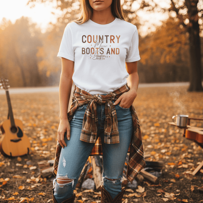 close-up of boots and bonfires country music t-shirt print detail