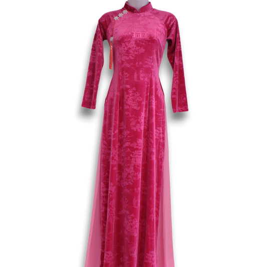 Pink traditional velvet dress on a mannequin against a white background