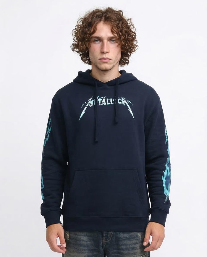 Person wearing a navy hoodie with a logo on a white background