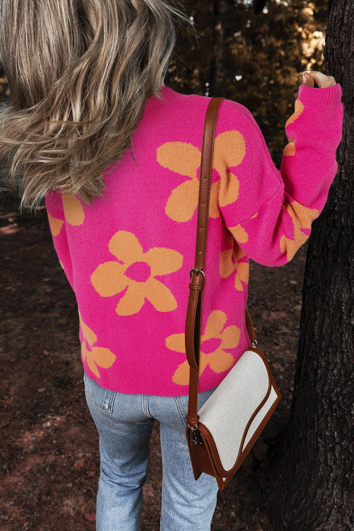 Pull à manches longues et col montant à motif de grandes fleurs roses