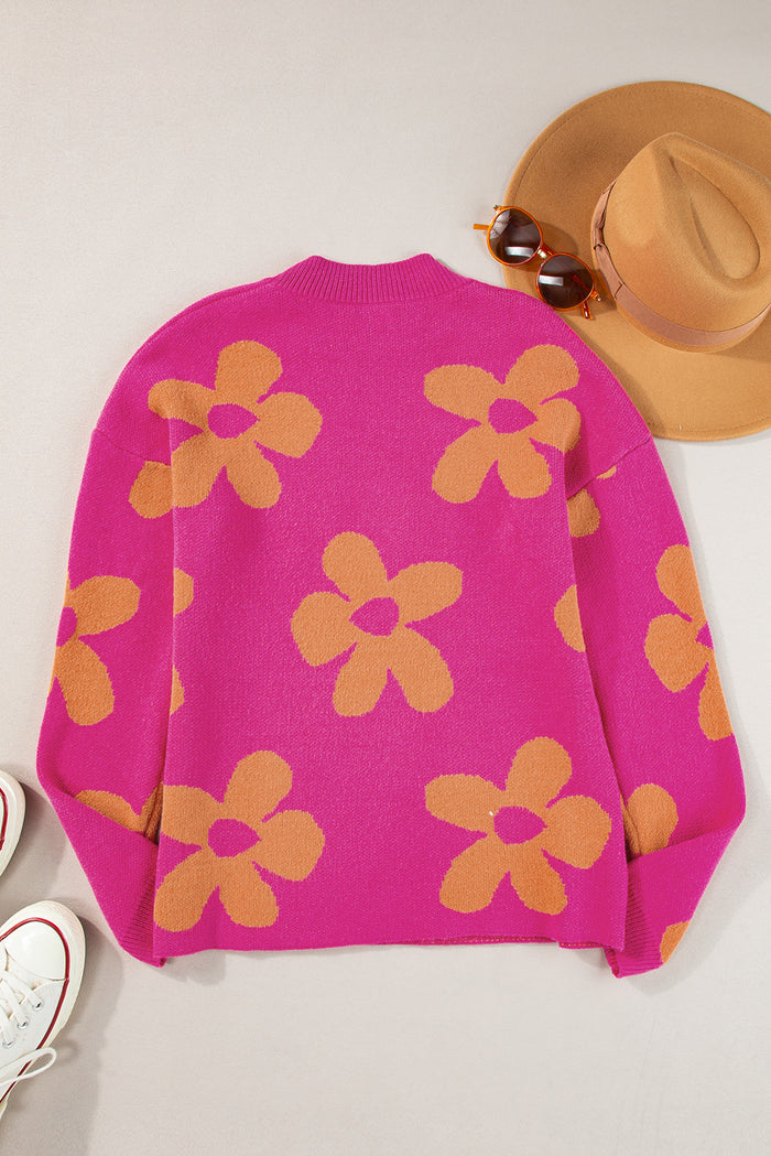 Pull à manches longues et col montant à motif de grandes fleurs roses