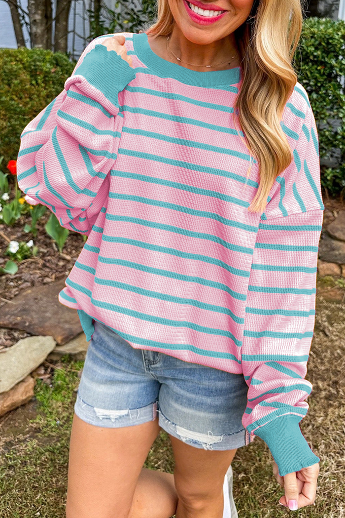 Pull ample à rayures roses et col rond *