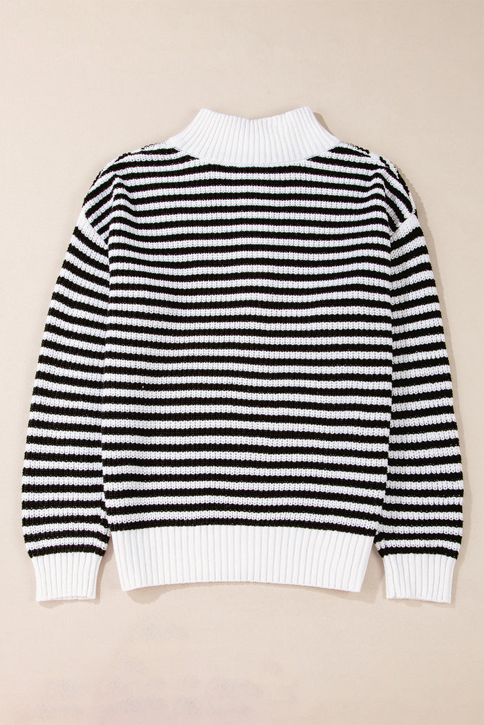 Pull noir à rayures, col zippé, épaules tombantes