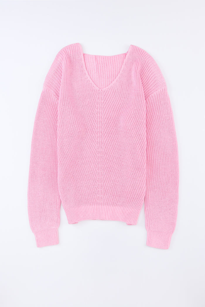 Pull rose en maille côtelée à col en V