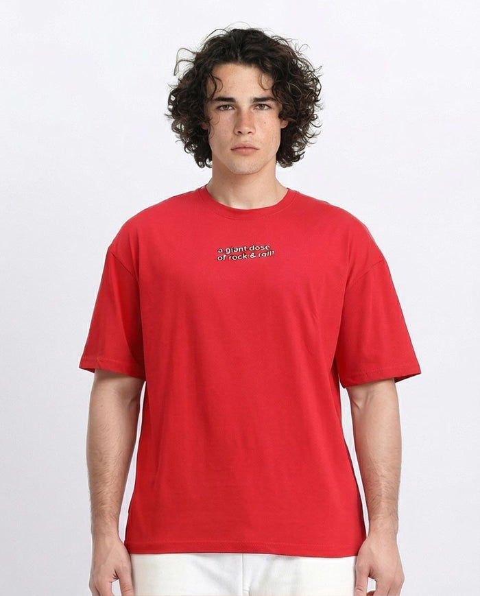 Person wearing a red t-shirt with text on a white background