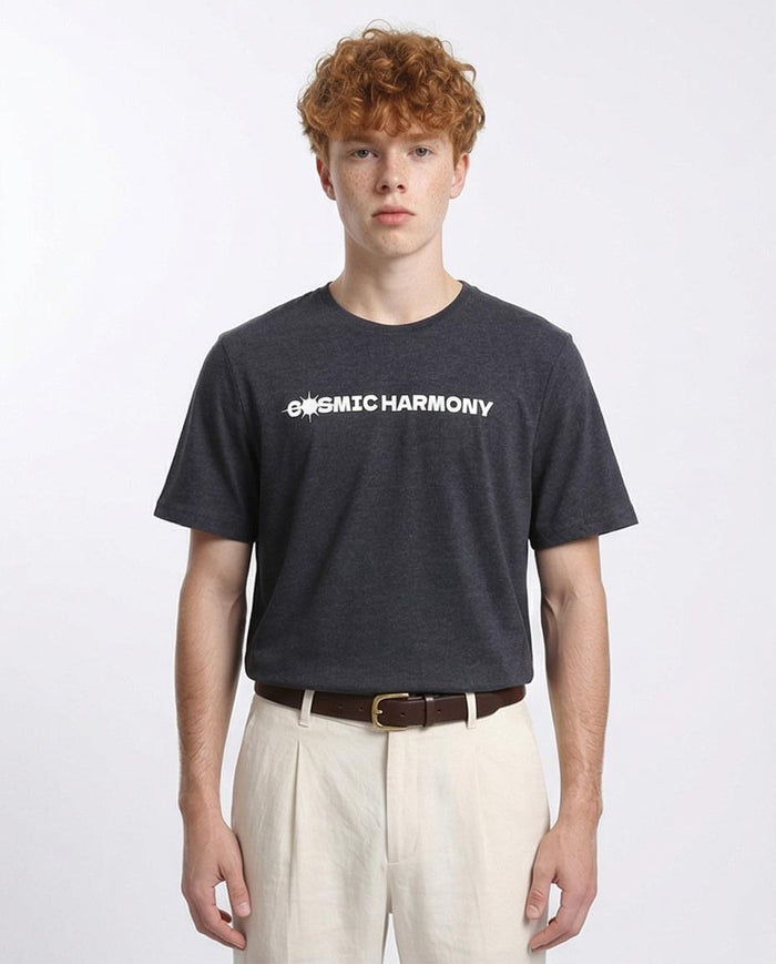 Person wearing a black t-shirt with 'OMIC HARMONY' text on a white background