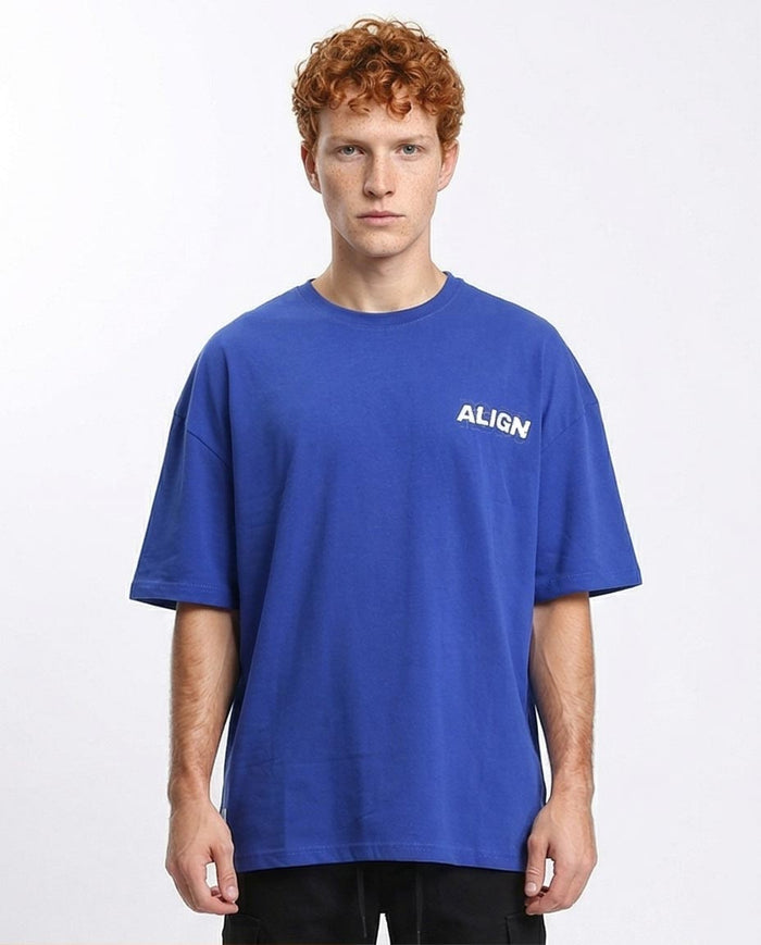 Person wearing a blue t-shirt with 'ALIGN' logo on a white background
