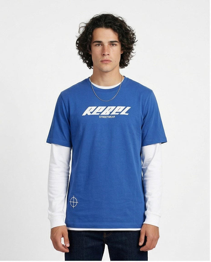 Person wearing a blue and white shirt with 'Rebel' logo on a white background