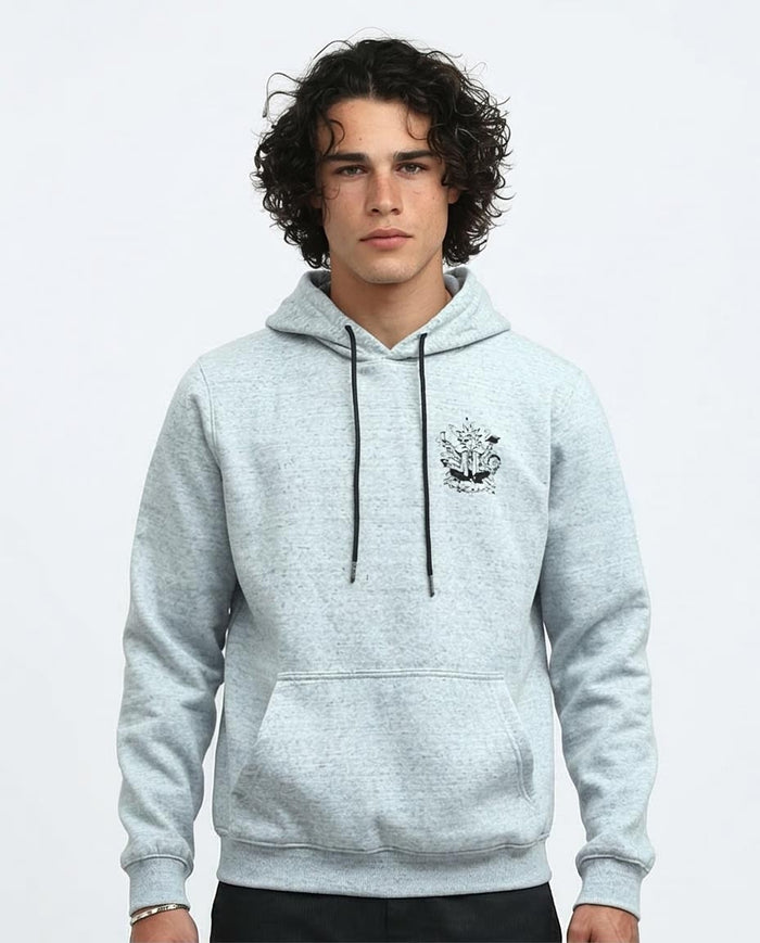 Person wearing a light gray hoodie with a logo on a white background