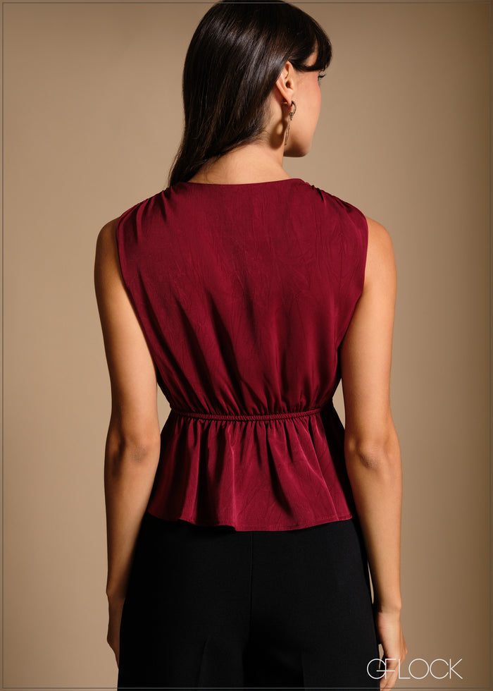 Sleeveless Peplum Top - 240426