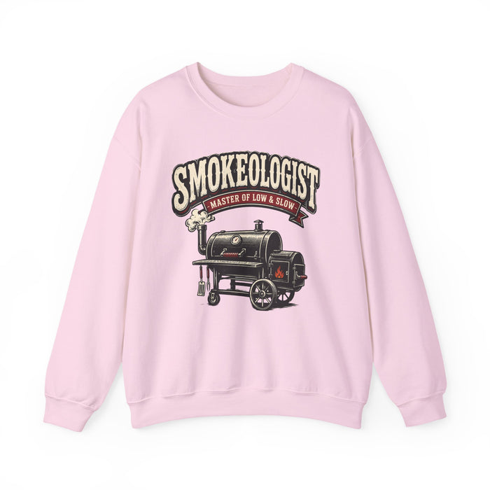 light pink sweatshirt with smokeologist master of low and slow bbq print