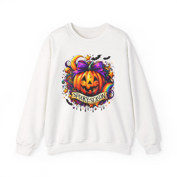 light pink sweatshirt with colorful pumpkin halloween graphic and whimsical spooky details