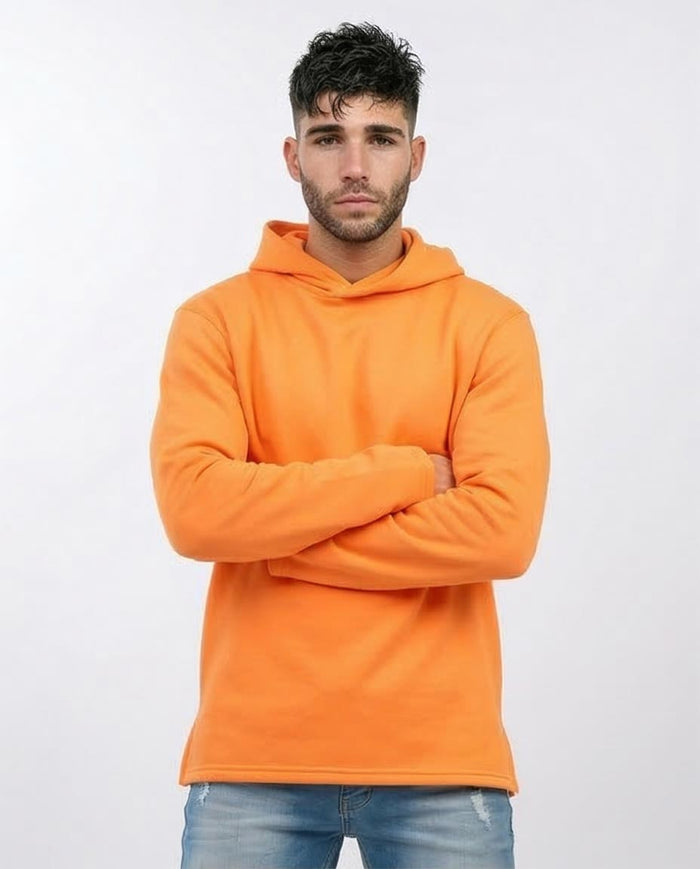 Man wearing an orange hoodie against a white background